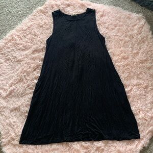 Black knit sleeveless dress with pockets